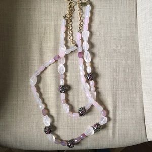 Light pink necklace with details